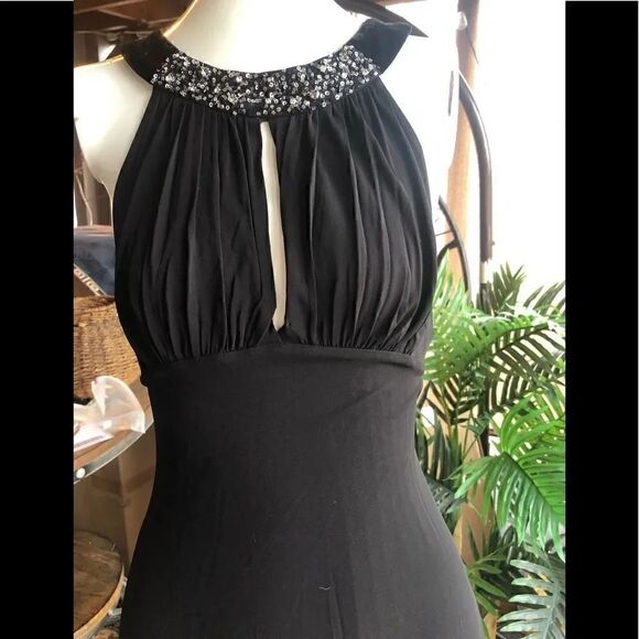 BCBGMaxAzria Dresses & Skirts - BCBGmaxazria Black halter dress velvet neck with sequins slit open in front